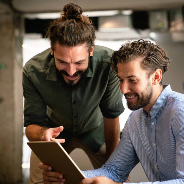 Multiethnic group of happy business people working together in office